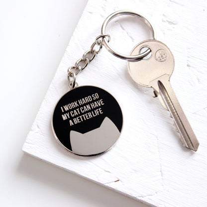 I work hard so my cat can have a better life keyring from Purple Tree Designs